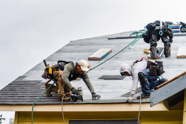 Professional Gutter Installation technician working in Badger, AK